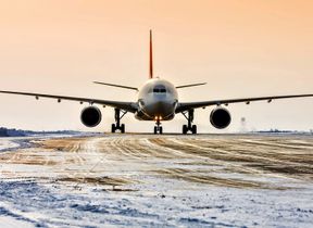 aeroplane-on-runway-covered-in-snow-and-ice