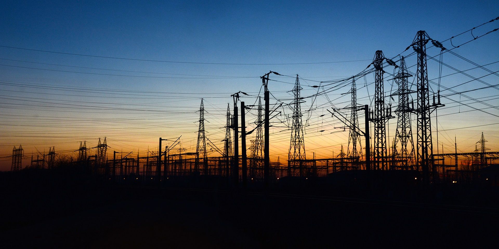electricity-pylons-at-night