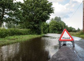 flood-sign-closed-country-road