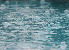 rain-falling-into-water