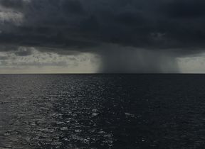 rain-falling-on-the-horizon-over-the-sea-photo-brian-cook