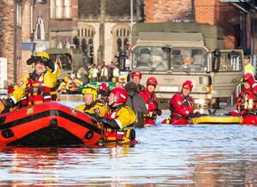 rescue-teams-in-a-flooded-town