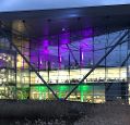 The Met Office's Exeter office illuminated at night