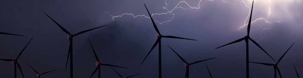Lightning bolt above a wind farm.