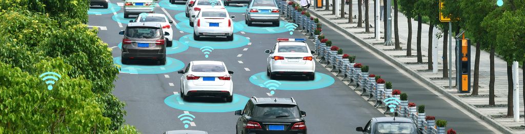 Connected Autonomous Vehicles on a metro city road with graphic sensor signal.