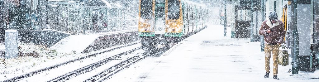 Train travelling in heavy snow
