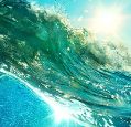 close-up of ocean wave reflecting sunshine