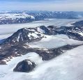 ice sheets at poles, covering glaciers in parts