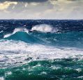 Stormy ocean waves breaking